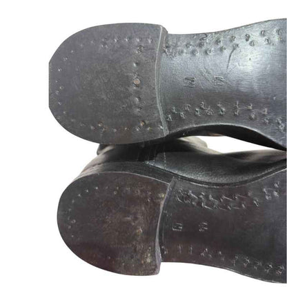 Close-up of leather sole with traditional wooden pegs