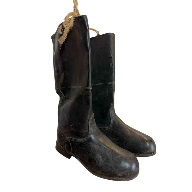 Front view of original Soviet Cold War yuft boots made from genuine leather, authentic USSR military footwear from the 1970s.