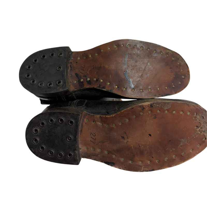 Leather soles reinforced with brass nails on original Soviet Cold War yuft boots from the 1970s.
