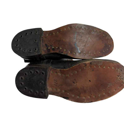 Leather soles reinforced with brass nails on original Soviet Cold War yuft boots from the 1970s.
