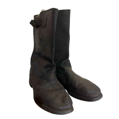 Front view of original Soviet kirza strap boots with adjustable buckle, designed for a comfortable fit on wide calves.