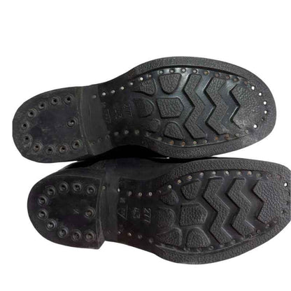 Heavy-duty rubber sole of original Soviet kirza strap boots from 1993, authentic Chechen War military footwear.
