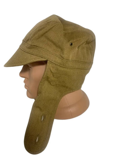 Side view of Soviet Afghanka visor cap M88 with ear flaps USSR military hat