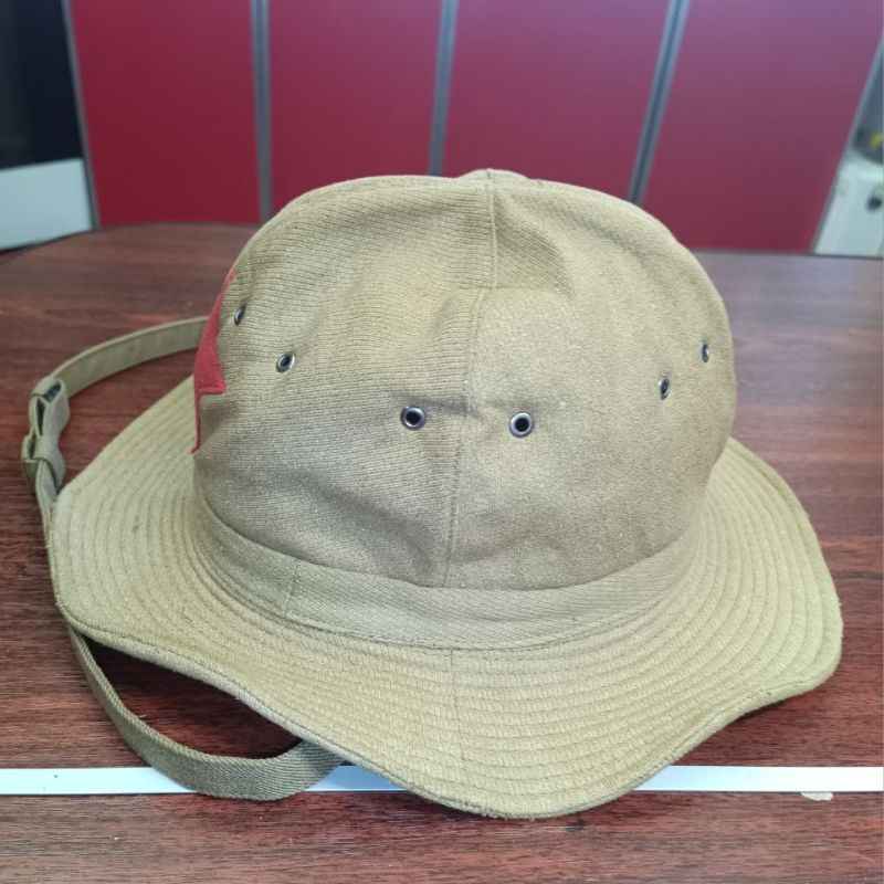 Side view of the Soviet RKKA M1938 Panama Hat replica showing the original canvas construction and ventilation eyelets
