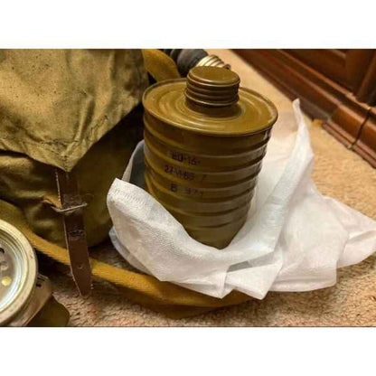 Interior view of original Soviet ShMS black gas mask showing eyepiece openings and internal rubber construction.