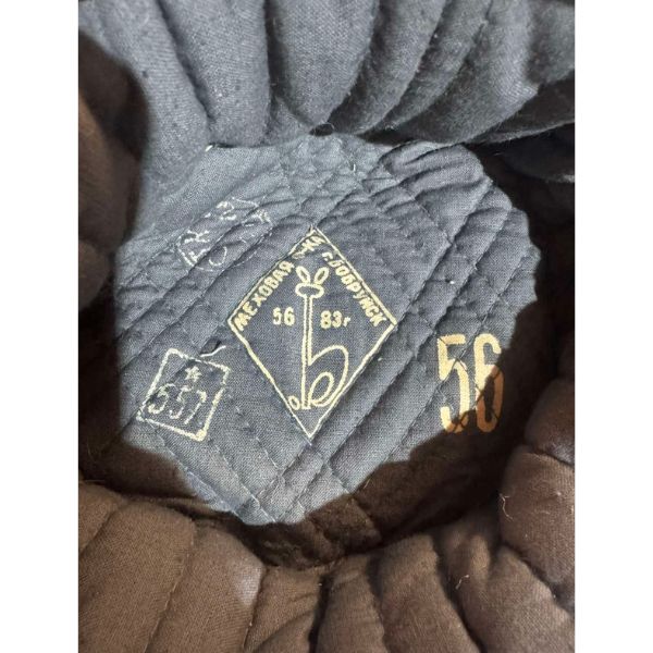 Back view of Soviet army ushanka winter hat from original military issue
