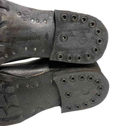 Close-up of the rubber heels and sole markings on Soviet VDV kirza boots in size 46.