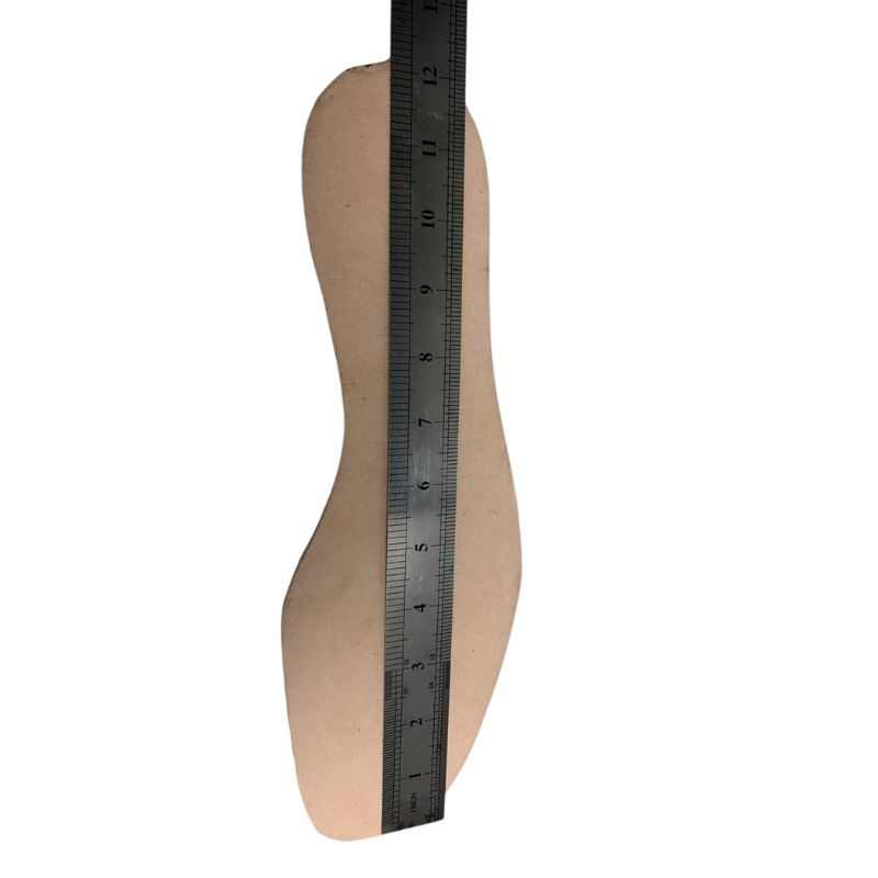 Insole from a size 46 Soviet VDV kirza boot with a ruler showing its length in centimetres.